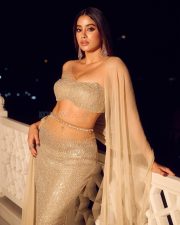 Stunning Bollywood Beauty Janhvi Kapoor in a Manish Malhotra Body Hugging Lehenga with an Off Shoulder Blouse and Sheer Dupatta Photos 04
