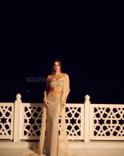 Stunning Bollywood Beauty Janhvi Kapoor in a Manish Malhotra Body Hugging Lehenga with an Off Shoulder Blouse and Sheer Dupatta Photos 05