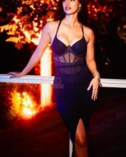 Stunning Figure Disha Patani Flaunting her Cleavage in a Black Slit Bodycon Dress Photos 02