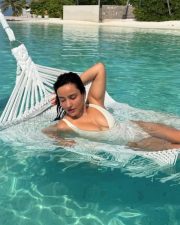 Stunning Hot Neha Sharma in a White Pool Bikini Photos 01