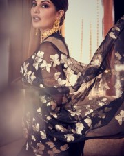 Stunning Jacqueline Fernandez in a Black Butterfly Saree at Vanita Awards Event Photos 06