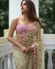 Stunning Janhvi Kapoor in a Pink Floral Embroidered Saree with a Sleeveless Pink Bralette Blouse Photos 02