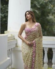 Stunning Janhvi Kapoor in a Pink Floral Embroidered Saree with a Sleeveless Pink Bralette Blouse Photos 06