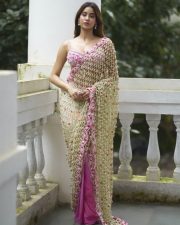 Stunning Janhvi Kapoor in a Pink Floral Embroidered Saree with a Sleeveless Pink Bralette Blouse Photos 10