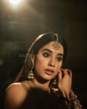 Stunning Janhvi Kapoor in a Red Rimple and Harpreet Lehenga with a Heavily Embellished Sleeveless Choli Photos 01