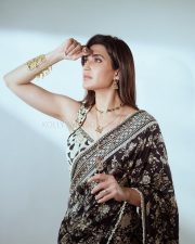 Stunning Karishma Tanna in a Black Printed Saree with a White Embroidered Blouse Pictures 02