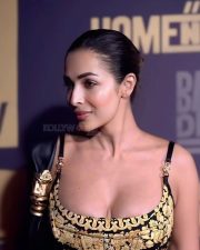Stunning MILF Malaika Arora in a Black and Golden Cleavage Outfit Photos 01