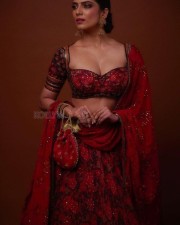 Stunning Mallu Beauty Malavika Mohanan in a Red Lehenga Photos 01