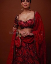 Stunning Mallu Beauty Malavika Mohanan in a Red Lehenga Photos 02