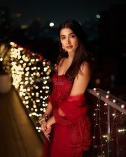 Stunning Pooja Hegde in a Strapless Off Shoulder Red Dress at Ramesh Taurani Annual Diwali Party Photos 07