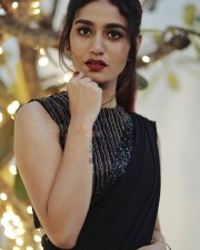 Stunning Priya Prakash Varrier in Black Georgette Embellished Saree Style Dress Photos 01