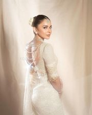 Stunning Rakul Preet Singh in a Trendy White Floral Embroidered Saree with a Silver Blouse Photos 04