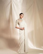 Stunning Rakul Preet Singh in a Trendy White Floral Embroidered Saree with a Silver Blouse Photos 05