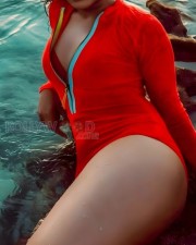 Stunning Rima Kallingal in a Red One Piece Swimsuit Pictures 02