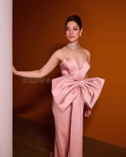 Stunning Tamannaah Bhatia in a Pink Off Shoulder Satin Gown with a Sweetheart Neckline and Bow for Bvlgari iconic Serpenti Collection Photos 09