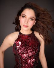 Stunning Tamannaah Bhatia in a Sleeveless Deep Wine Red Bodycon Dress Photos 04