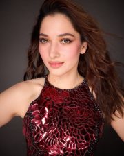 Stunning Tamannaah Bhatia in a Sleeveless Deep Wine Red Bodycon Dress Photos 05