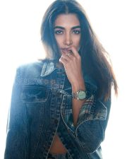 Stylish Actress Pooja Hegde in a Blue Denim Jacket And Plaid Flannel Shirt Photos 03
