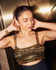 Stylish Actress Rakul Preet Singh in a Gold Embellished Crop Top Photos 01