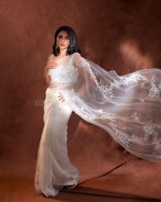 Stylish Aishwarya Lekshmi in a Transparent Sequin White Saree with Matching Blouse Pictures 01