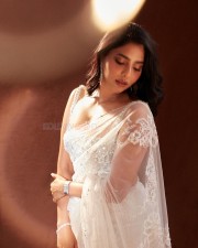 Stylish Aishwarya Lekshmi in a Transparent Sequin White Saree with Matching Blouse Pictures 03