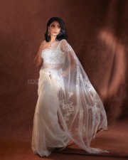 Stylish Aishwarya Lekshmi in a Transparent Sequin White Saree with Matching Blouse Pictures 04