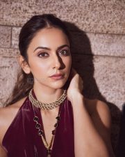 Stylish Hot Rakul Preet Singh in a Red Metallic Draped Dress with a Halterneck and Thigh Slit Photos 01
