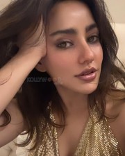 Stylish Hottie Neha Sharma in a Golden Deep Plunge Top Pictures 01