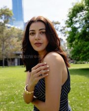 Stylish Kajal Aggarwal in a Navy Blue White Striped Maxi Dress Photos 01