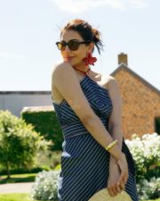 Stylish Kajal Aggarwal in a Navy Blue White Striped Maxi Dress Photos 02