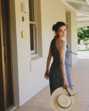 Stylish Kajal Aggarwal in a Navy Blue White Striped Maxi Dress Photos 03