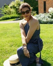 Stylish Kajal Aggarwal in a Navy Blue White Striped Maxi Dress Photos 04