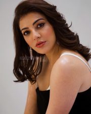 Stylish Kajal Aggarwal in a Spanish Cady Fabric Dress with Wide Straps in Contrast White Crepe and 3D Flowers Embellishments Photos 02