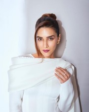 Stylish Kriti Sanon in a White Bodycon Dress Stills 01