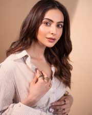 Stylish Rakul Preet Singh in a Floral Corset Mini Dress with a Striped Shirt Photos 02