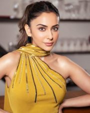 Stylish Rakul Preet Singh in a Yellow Dress Pictures 01