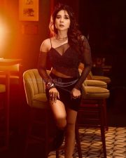 Sultry Beauty Sakshi Agarwal in a Black Mini Skirt and Transparent Top with a Black Bra Photos 02