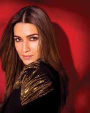 Sultry Hot Kriti Sanon in a Black Bralette Black Embellished Blazer and Flared Pants Photos 02