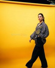 Tamanna Walking in a Black Baggy Pant 01