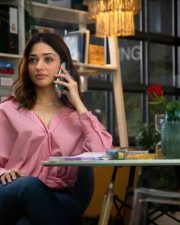 Tamannaah Bhatia on the Phone in a Cafe Photo 01