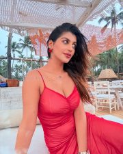 Tamil Beauty Yashika Aannand in a Red Open Back Midi Dress Pictures 01
