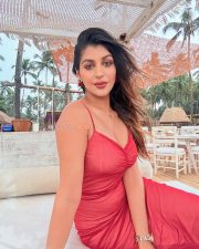 Tamil Beauty Yashika Aannand in a Red Open Back Midi Dress Pictures 02