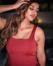 Tamil Glamour Actress Yashika Aannand in a Deep Red Corset Bodysuit with a Red Sequined Mini Skirt Pictures 03