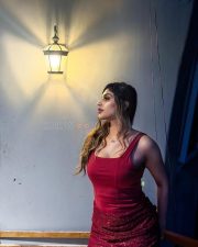 Tamil Glamour Actress Yashika Aannand in a Deep Red Corset Bodysuit with a Red Sequined Mini Skirt Pictures 05