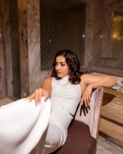 Tempting Catherine Tresa in a White Halter Neck Sleeveless Jumpsuit Photos 04
