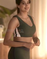Tempting Janhvi Kapoor in a Dark Green Scoop Neck Sports Bra with a Matching High Waisted Leggings Photos 01