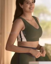Tempting Janhvi Kapoor in a Dark Green Scoop Neck Sports Bra with a Matching High Waisted Leggings Photos 02