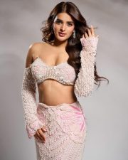 Tempting Nidhhi Agerwal in a Light Pink Lehenga with a Bustier Style Off Shoulder Top with Matching Mermaid Skirt Photos 07