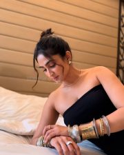 Thaanara Actress Deepti Sati in a Black Strapless Mid Length Midi Dress Pictures 02