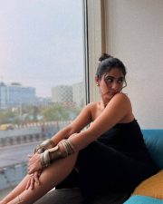 Thaanara Actress Deepti Sati in a Black Strapless Mid Length Midi Dress Pictures 05